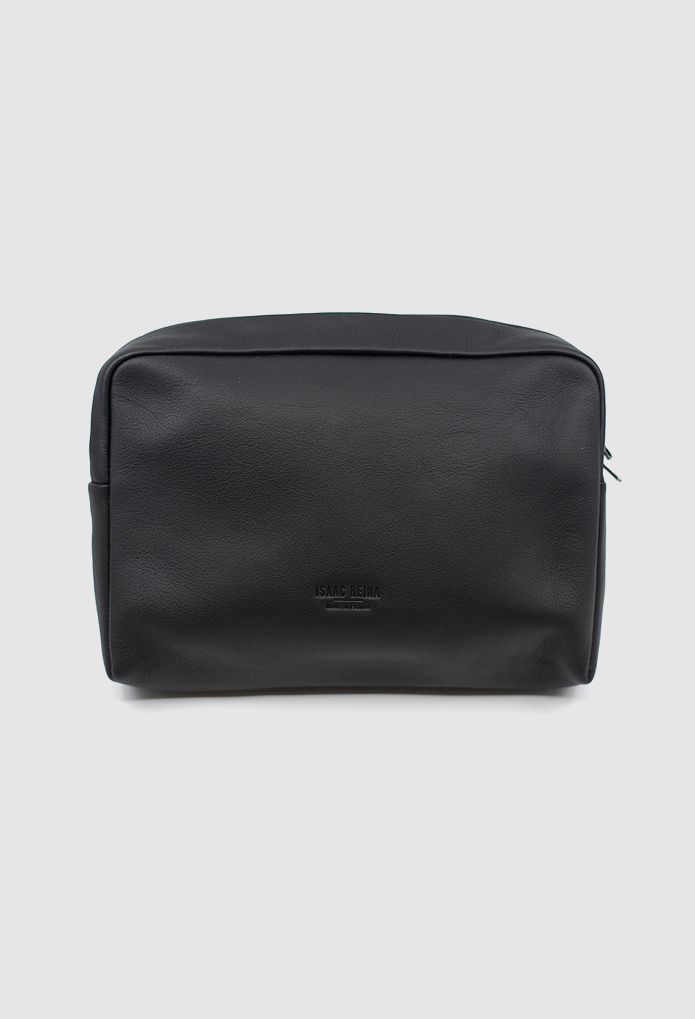 Black leather pouch on a light gray background