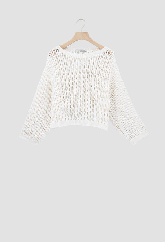 An off-white open-knit cropped sweater with three-quarter sleeves, hanging on a wooden hanger against a light gray background.