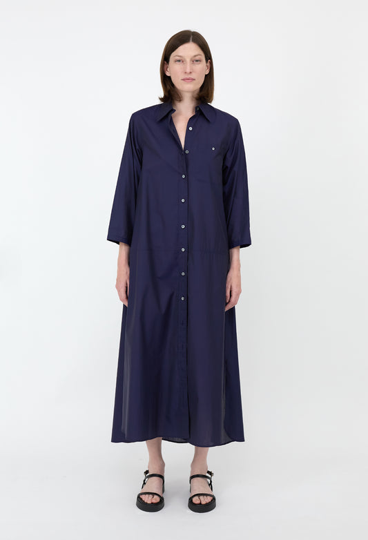 Penelope - A navy blue, long, lightweight shirt dress with a collar and buttons down the front.